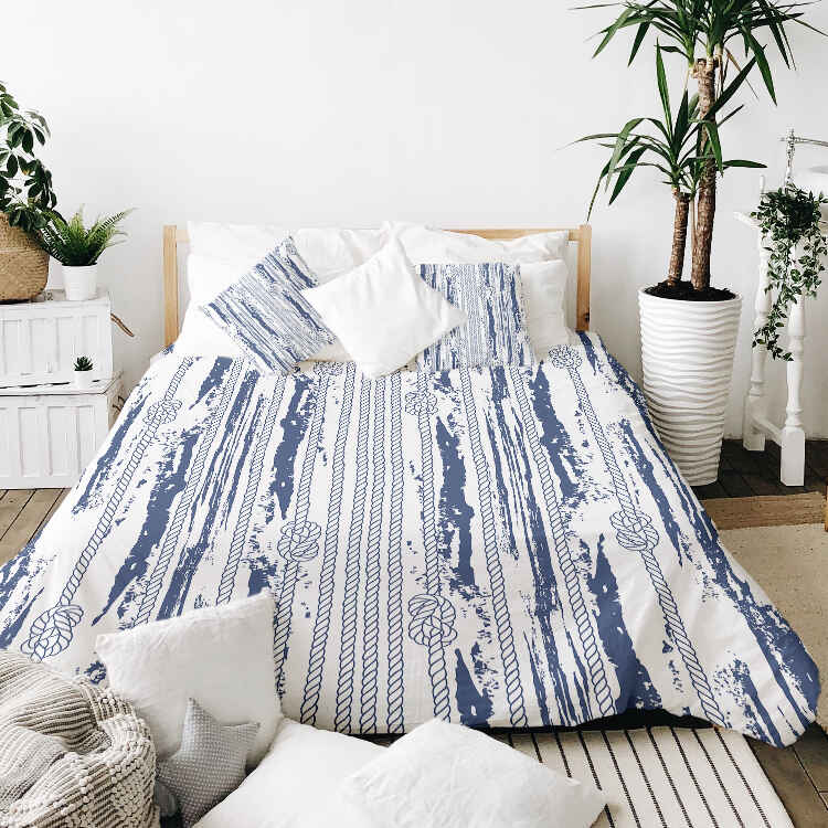 Set de ropa de cama con manta terapéutica y patrón a rayas