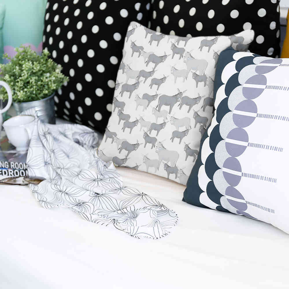 Almohada de salud gris con burros