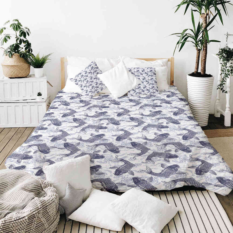 Set de ropa de cama con mantas terapéuticas y kois azules