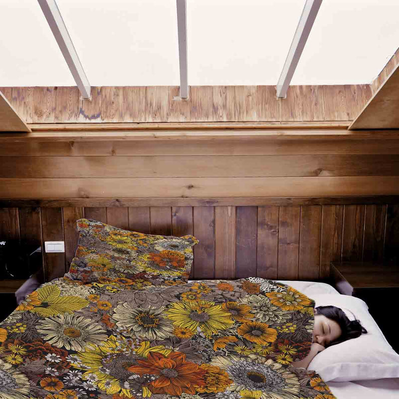 Set de ropa de cama con manta terapéutica y flores amarillas