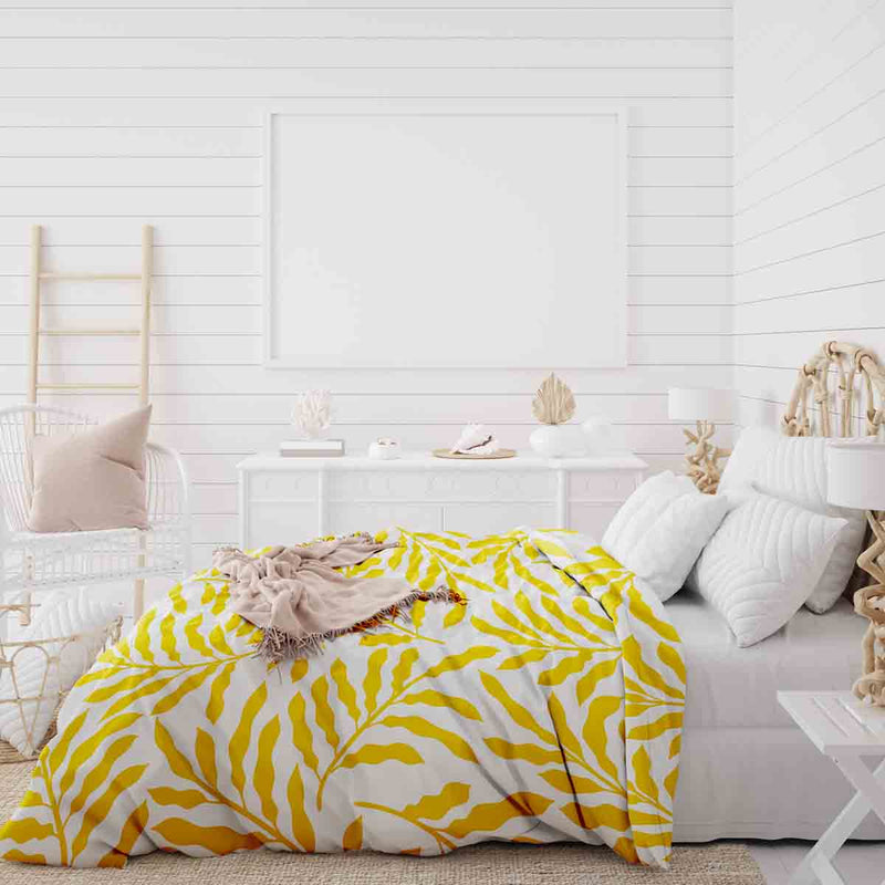 Set de ropa de cama con mantas terapéuticas y ramas amarillas