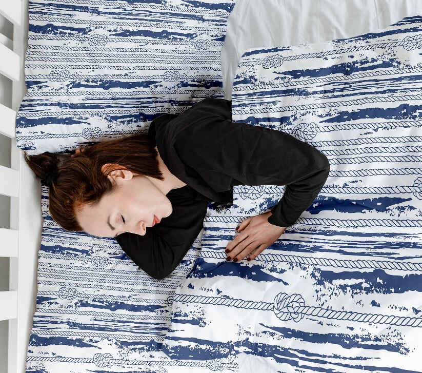 Set de ropa de cama con manta terapéutica y patrón a rayas