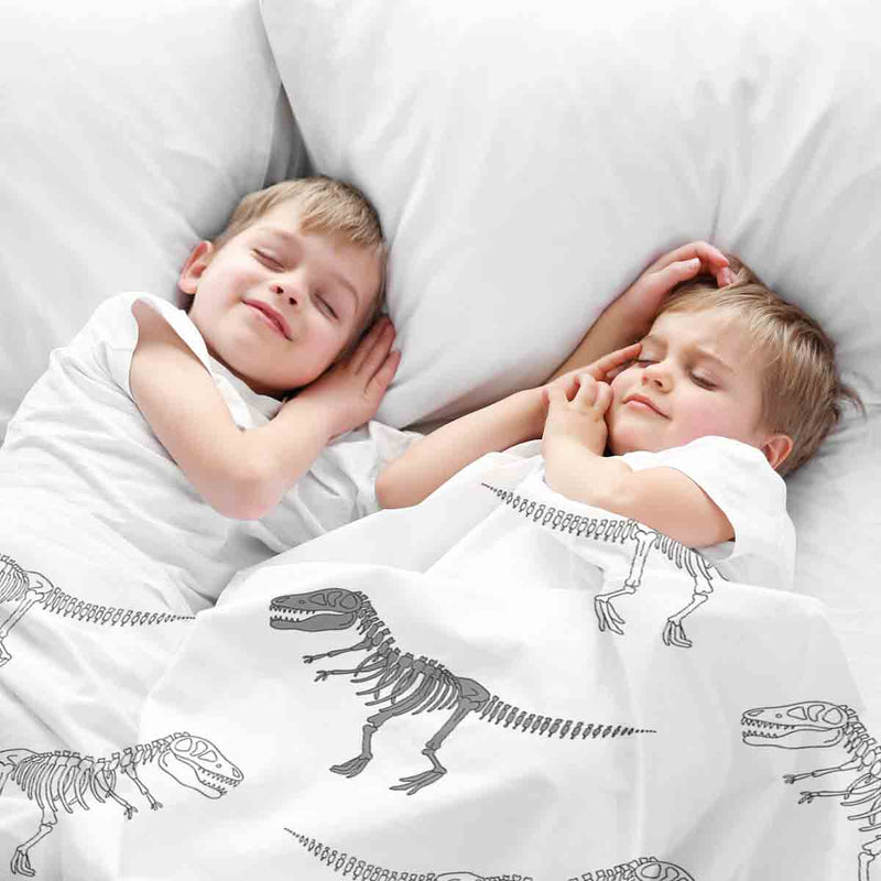Juego de ropa de cama con manta terapéutica blanca con esqueleto de dinosaurio