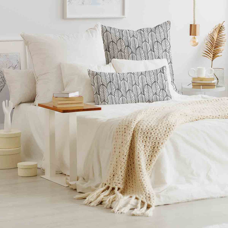 Almohada de salud gris con hojas de arce