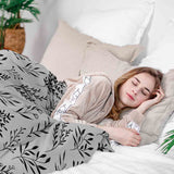 Juego de ropa de cama con manta terapéutica blanca con ramas negras