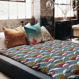 Set de ropa de cama con mantas terapéuticas y rompeolas coloridos