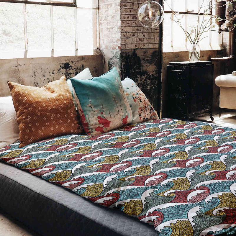 Set de ropa de cama con mantas terapéuticas y rompeolas coloridos
