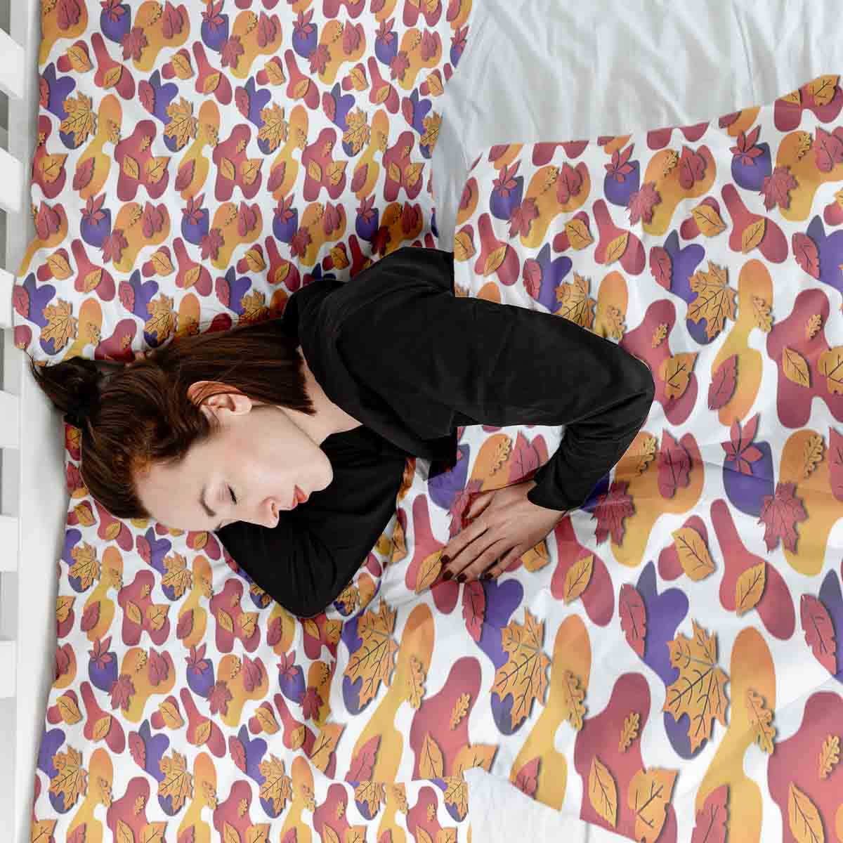 Set de ropa de cama con mantas terapéuticas y manchas de colores
