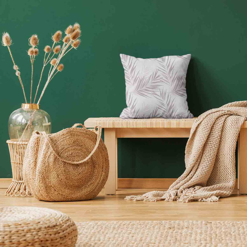 Almohada de salud blanca con hojas moradas