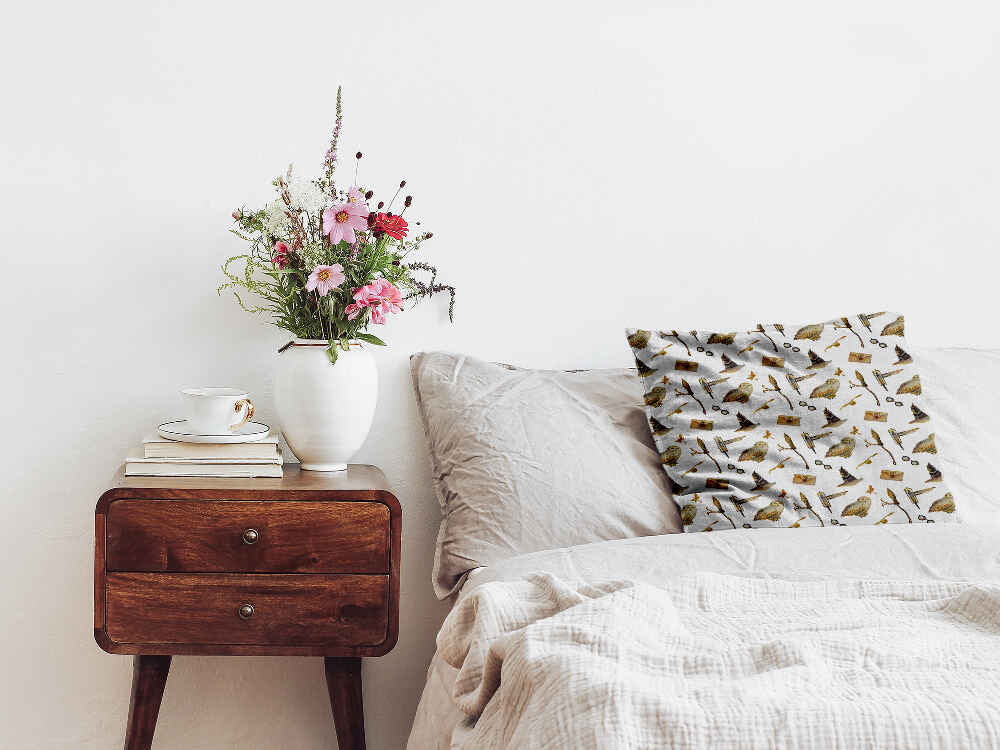 Almohada de salud blanca con búhos