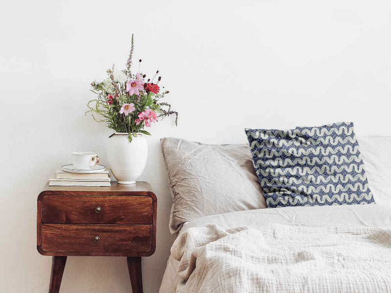 Almohada de salud azul con ondas blancas
