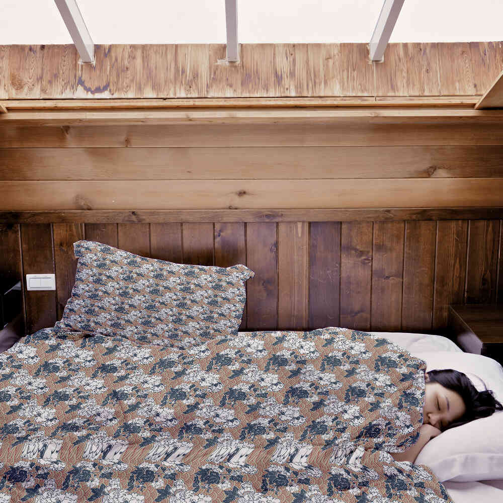 Juego de ropa de cama con mantas terapéuticas y flores