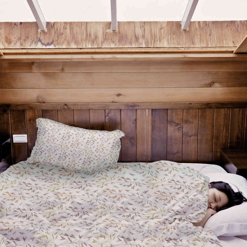 Set de ropa de cama con mantas terapéuticas y delicadas ramas coloridas