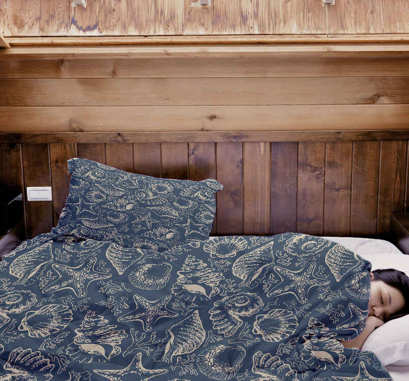 Set de ropa de cama con manta terapéutica azul con conchas