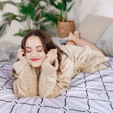 Set de ropa de cama con manta terapéutica y patrón ondulado