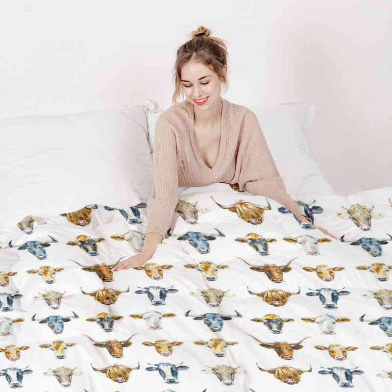 Juego de ropa de cama con mantas terapéuticas blancas con cabezas de toro