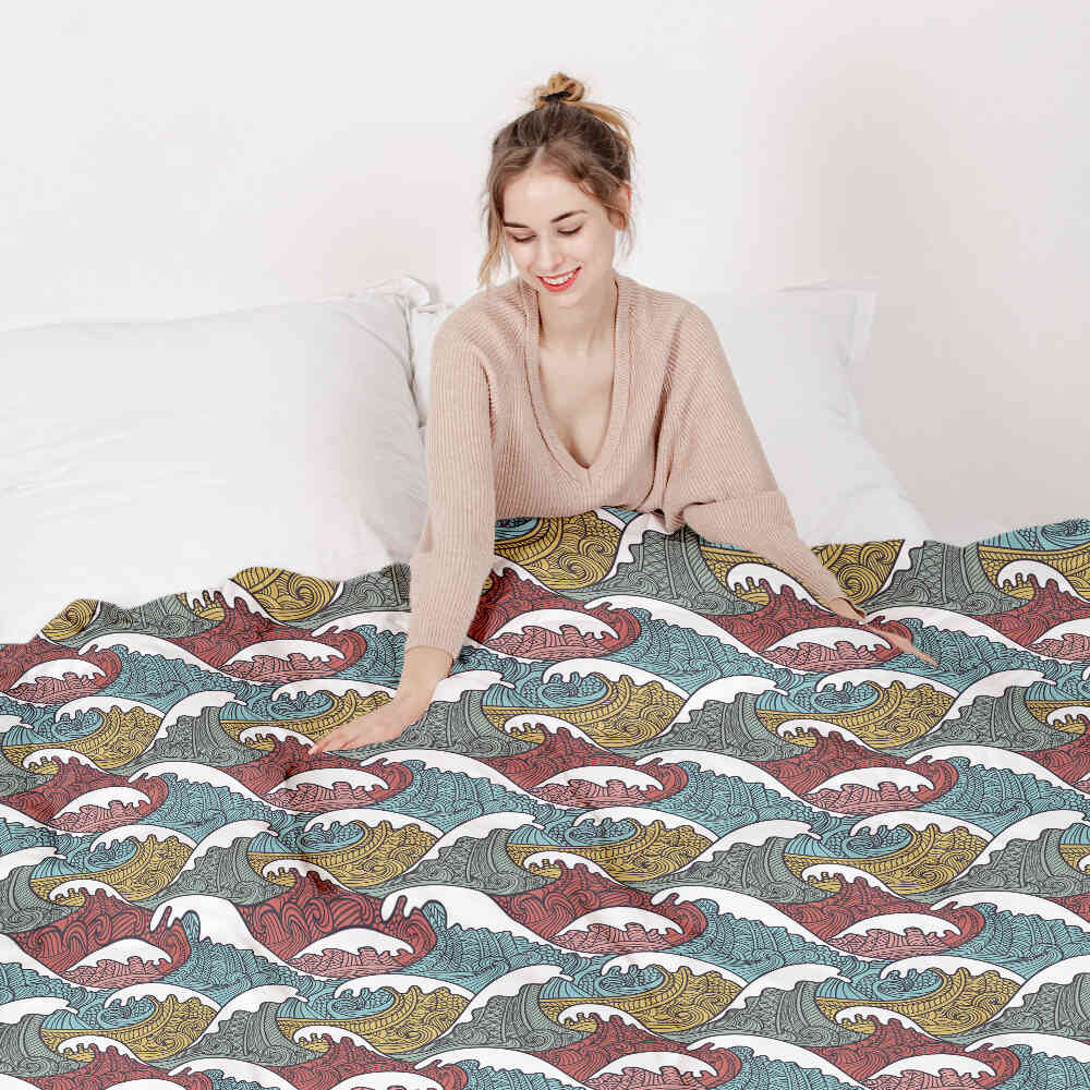 Set de ropa de cama con mantas terapéuticas y rompeolas coloridos