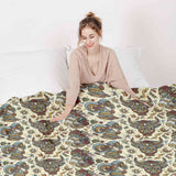 Set de ropa de cama con mantas terapéuticas y cabezas de animales coloridas