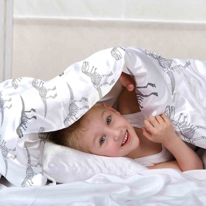 Juego de ropa de cama con manta terapéutica blanca con esqueleto de dinosaurio