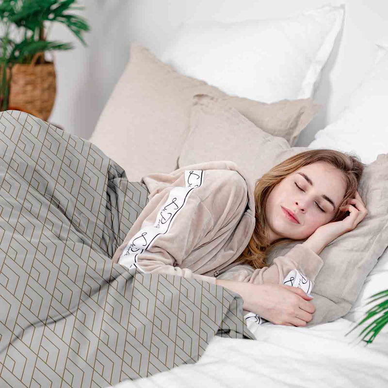 Set de ropa de cama con manta terapéutica y patrón de rayas doradas